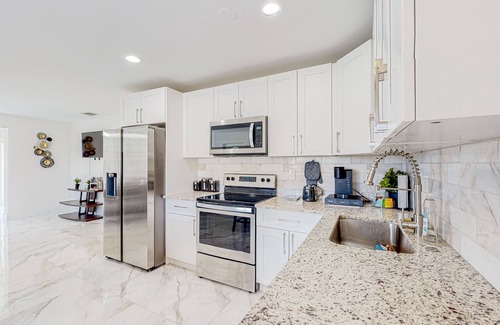 Pompano Beach House | Breezy dog-friendly home near Deerfield Beach with private pool, lawn, fast WiFi