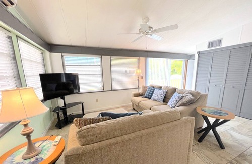 Cudjoe Key Cottage | Breezy Palm 2 bedroom with pool, hot tub, tennis courts, and boat access.