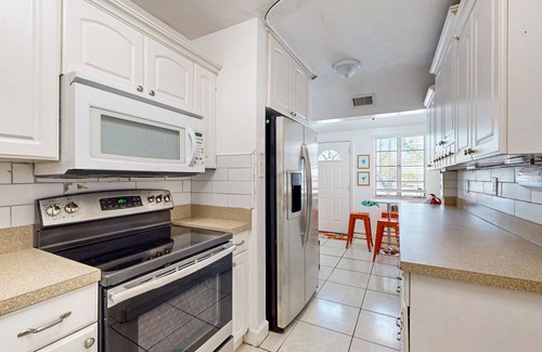 Indian Beach Sapphire Shores House | Bright, airy and centrally located with fenced yard, dog friendly, close to Gulf