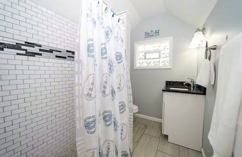 Long Branch Apartment | Bright & Airy Beach Nest blocks to sand, ocean fun