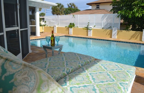 Juno Beach House | Bright, airy private home with pool steps to beach