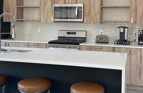 Stevensville House | Bright and Airy Lakefront Home - Pool open May-Oct 21