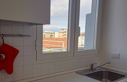 Cagnola Apartment | Bright and modern one-bedroom apartment with terrace.