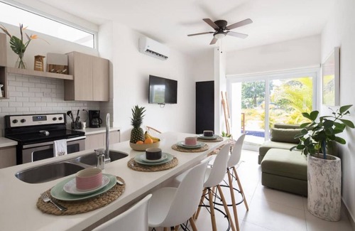 Jaco Apartment | Bright and stylish new condo, 5 min walk to the beach.