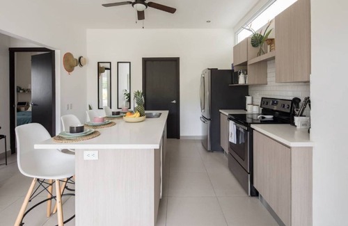 Jaco Apartment | Bright and stylish new condo, 5 min walk to the beach.