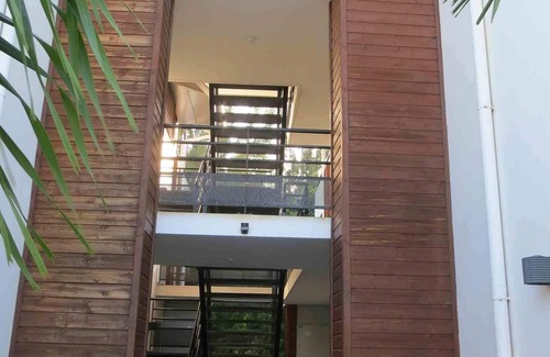 La Saline Les Bains Apartment | Bright apartment 80 meters from the lagoon, with large covered terrace