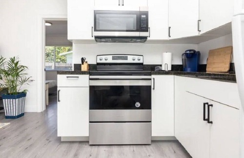 Middle River Terrace House | Bright Garden Getaway - w/ Private Patio & Parking