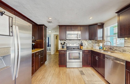 Pinellas Park House | Bright Home with Private Pool, High-Speed WiFi, Firepit, Outdoor Bar, and Grill