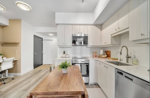 Kitchener Apartment | Bright & Modern Downtown Stay