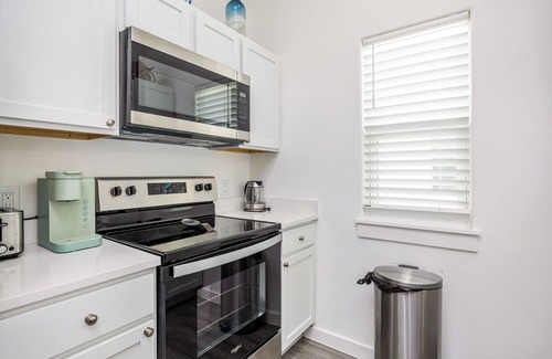 Corpus Christi House | Bright & Modern Retreat w/Pool & Pirate ship Playground, Steps from the Beach