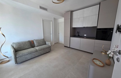 Municipio 5 Apartment | Bright suite with covered terrace and sea view, Santo Spirito area