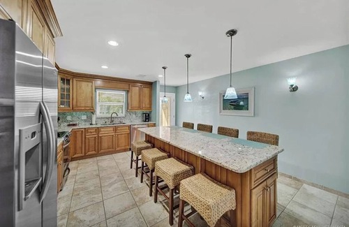 Hutchinson Island South House | Bring your boat and come enjoy island life in this canal front home!