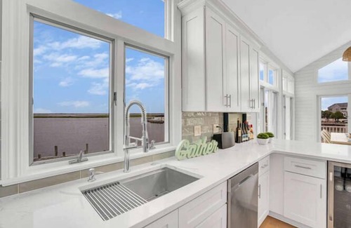 Ocean Beach III House | Bring your boat! Bay Front Contemporary with New In-ground Salt Water Pool