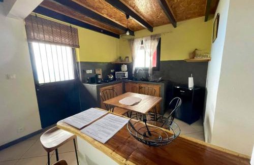 Trois-Bassins House | Bungalow charmant à Les Trois Bassins avec vue sur mer