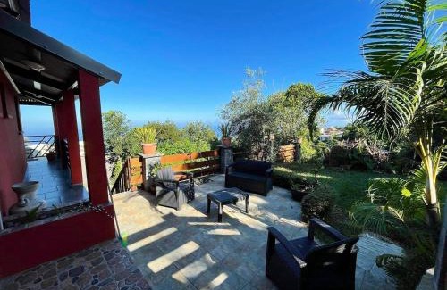 Trois-Bassins House | Bungalow charmant à Les Trois Bassins avec vue sur mer