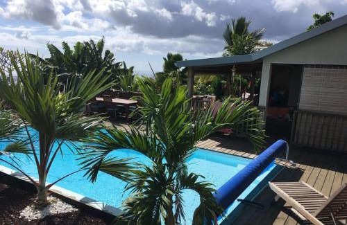 Bois de Nefles Ski Chalet | Bungalow cosy avec piscine surplombant l'océan