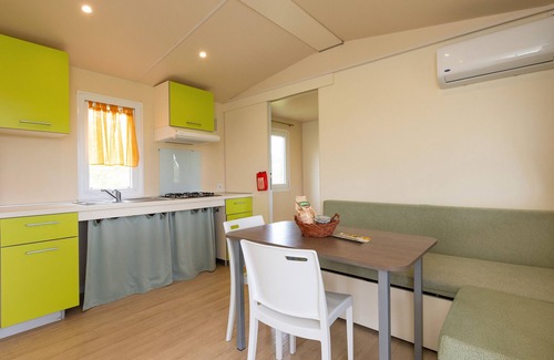 Bibbona House | Bungalow 'Sole2' with Shared Pool, Private Terrace and Air Conditioning