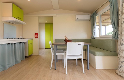 Bibbona House | Bungalow 'Sole2' with Shared Pool, Private Terrace and Air Conditioning