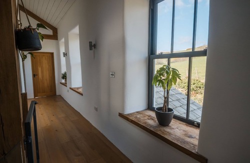 Newquay Cottage | Bunny Cottage is an original farm cottage that has been updated to provide a spacious country retrea