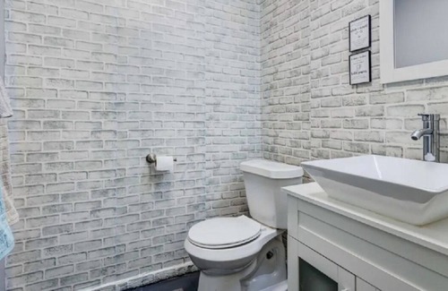 Theodore House | Business ready - a comfortable work and living space for traveling professionals