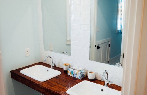 Bywater Bed & Breakfast | "Bywater Breeze" Private upstairs bedroom, kitchenette, full bathroom, & balcony