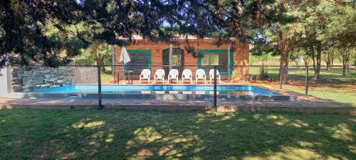 Los Reartes House | Cabañas UN LUGAR