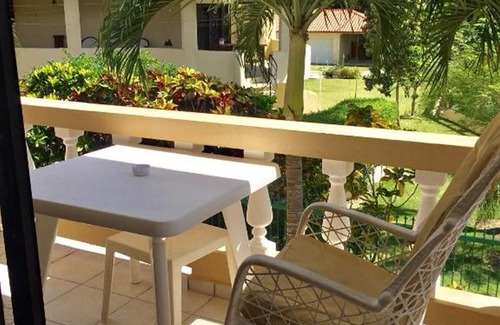 Cabarete Apartment | Cabarete beach apartment, steps from sea and shops, pool/AC/balcony
