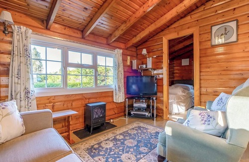 Bronaber House | Cabin 280 is a gold graded cabin located towards the bottom of the holiday village and has a large p