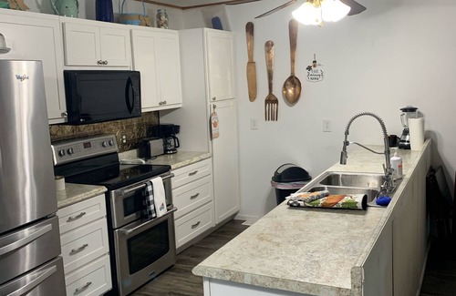 Doniphan House | Cabin Right on Current River, conveniently located close to town.