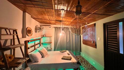 Taganga Apartment | Cabin with balcony and ocean view.