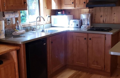 Adelma Beach Cabin | Cabins at Treefrog Woods, Port Townsend. Includes two(2)private cabins & grounds