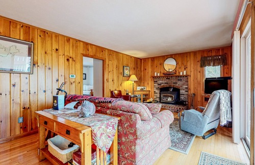 East Wakefield House | Calming dog-friendly lake view home with firepit, wood stove, patio, & gas grill