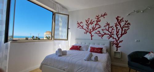 Livorno Apartment | -Camera con Vista mare spettacolare sulla Terrazza Mascagni