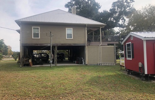 Kaplan Cabin | Camp Paradise Pecan Island- Red Cabin Only