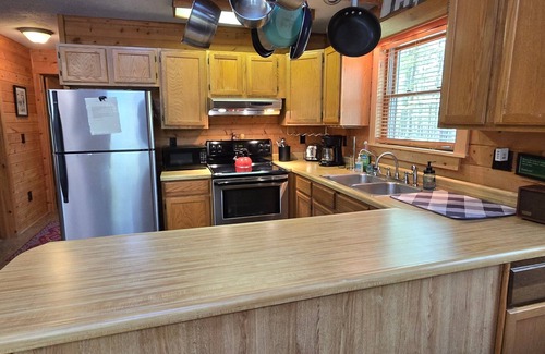 Swanton Cabin | Camp Valentine- charming 3 bedroom cabin with hot tub and fireplace in private setting