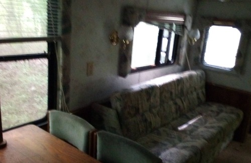 Wake Forest House | Camper off home in wooded property small creek.