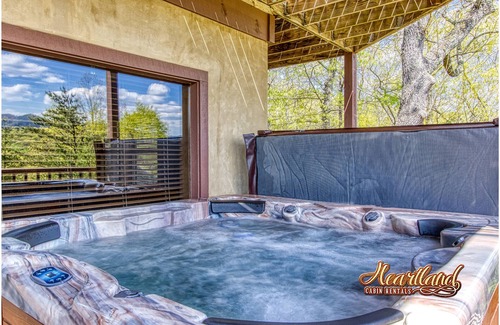 Gatlinburg - Pigeon Forge Cabin | Campfire Lodge is a beautiful cabin with all the special touches needed to make your stay memorable!