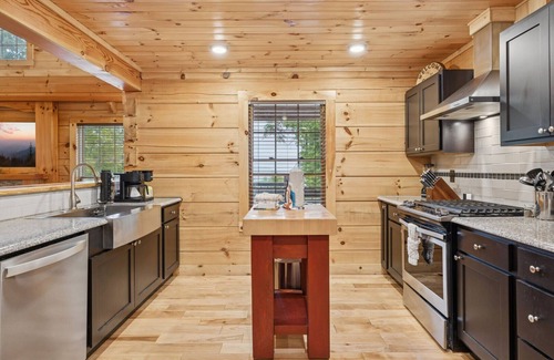 Gatlinburg - Pigeon Forge Cabin | Campfires and Cornbread is a 2 bedroom cabin with loft and loaded amenities!