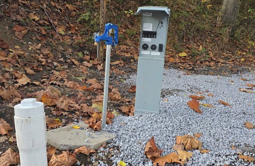 Fowler RV Rental | Campground in Masury 50 Amp full hook up sewer and water for winter camping