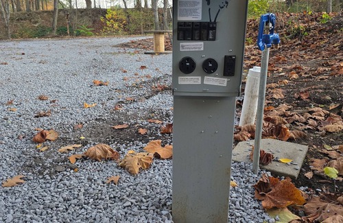 Fowler RV Rental | Campground in Masury 50 Amp full hook up sewer and water for winter camping