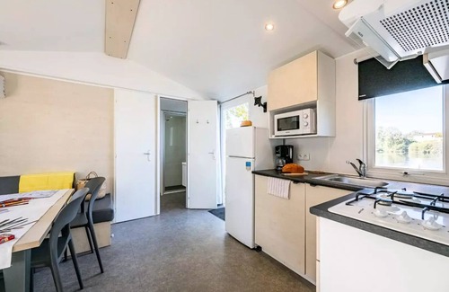 Badefols-sur-Dordogne House | Camping Les Bö-Bains * - 3-bedroom mobile home on the banks of the river, air-conditioned Sunday/Sunday (33 m²) n°3 to 5 6 people