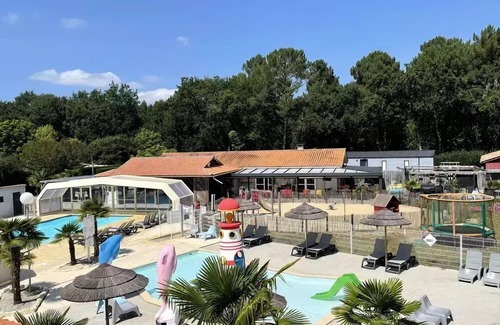 Saint-Laurent-de-Medoc House | Camping Le Paradis * - Mobile Home Ancolie 4 Rooms 5 People + TV