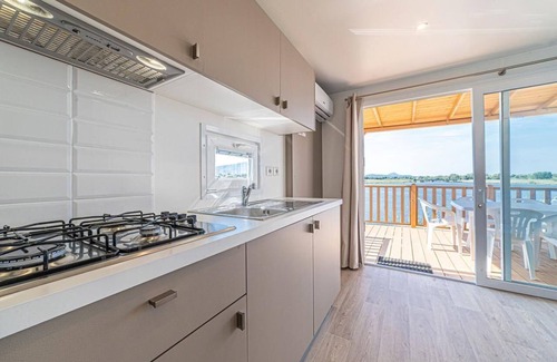 Fertilia House | Camping Village Laguna Blu Baia Revolution für 6 Personen