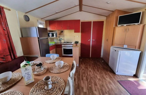 Peyrignac House | Campsite LA GARENNE * - 20 Residence La Futaie 32m2 Terrace Covered , 3 bedrooms, dishwasher + TV 6 persons