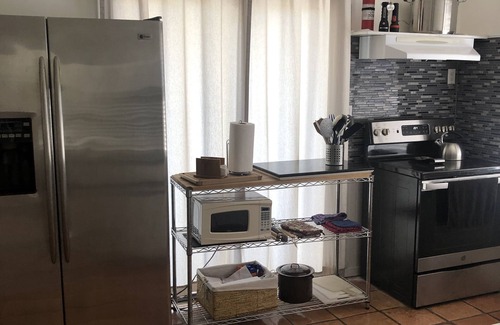 Whitney Beach Cottage | Canal front cottage, walking distance to sandy Gulf