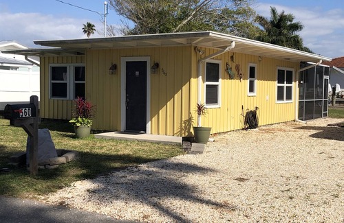 Whitney Beach Cottage | Canal front cottage, walking distance to sandy Gulf