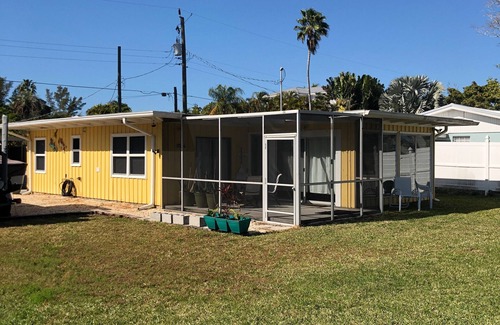 Whitney Beach Cottage | Canal front cottage, walking distance to sandy Gulf