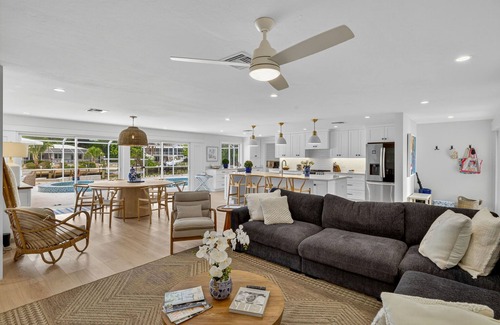 Sanibel House | Canal front ground level beauty steps to the beach