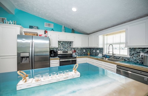 Cedar Lane House | Canal Front Home w/Fishing Pier & Game Room