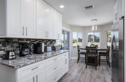 Palm Harbor House | Canal-Front House With Covered Deck, Pool, Dock + Prime Location